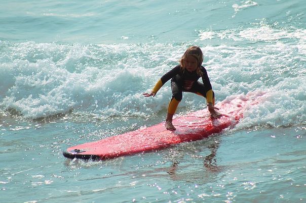 Hot fun summertime kids surf camp is the best for holidays